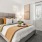 Bedroom with natural lighting and high ceilings