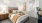 Bedroom with natural lighting and high ceilings