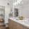 a spacious bathroom with a linen area